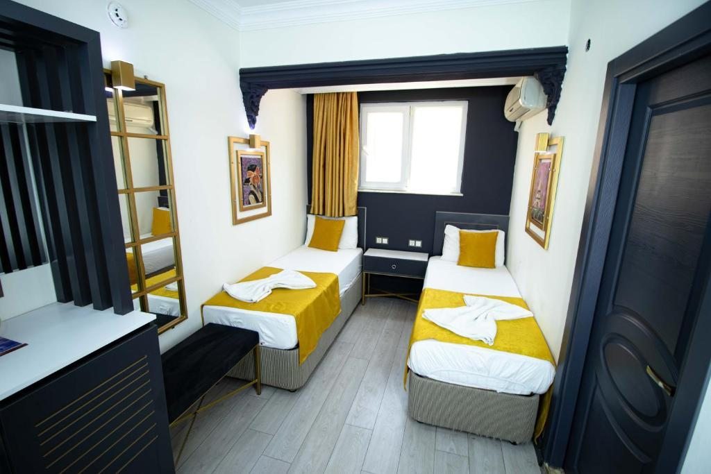 Двухместный (Стандартный двухместный номер с 2 отдельными кроватями) отеля Exporoyal Hotel, Анталия