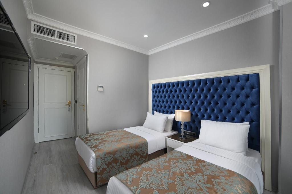 Двухместный (Улучшенный двухместный номер с 1 кроватью или 2 отдельными кроватями) отеля White Monarch, Стамбул