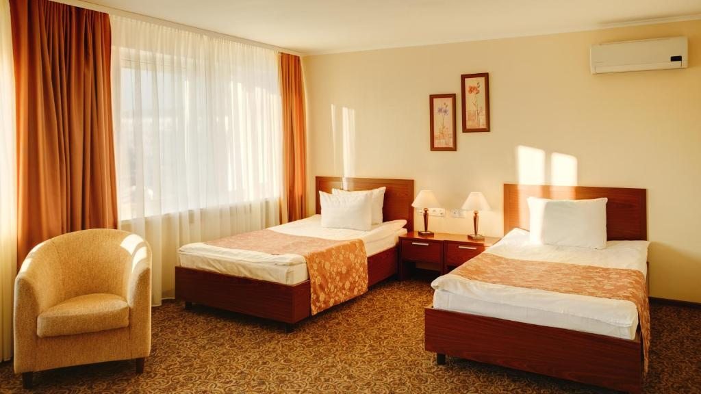 Двухместный (Стандартный двухместный номер с 1 кроватью или 2 отдельными кроватями) отеля Урал, Пермь