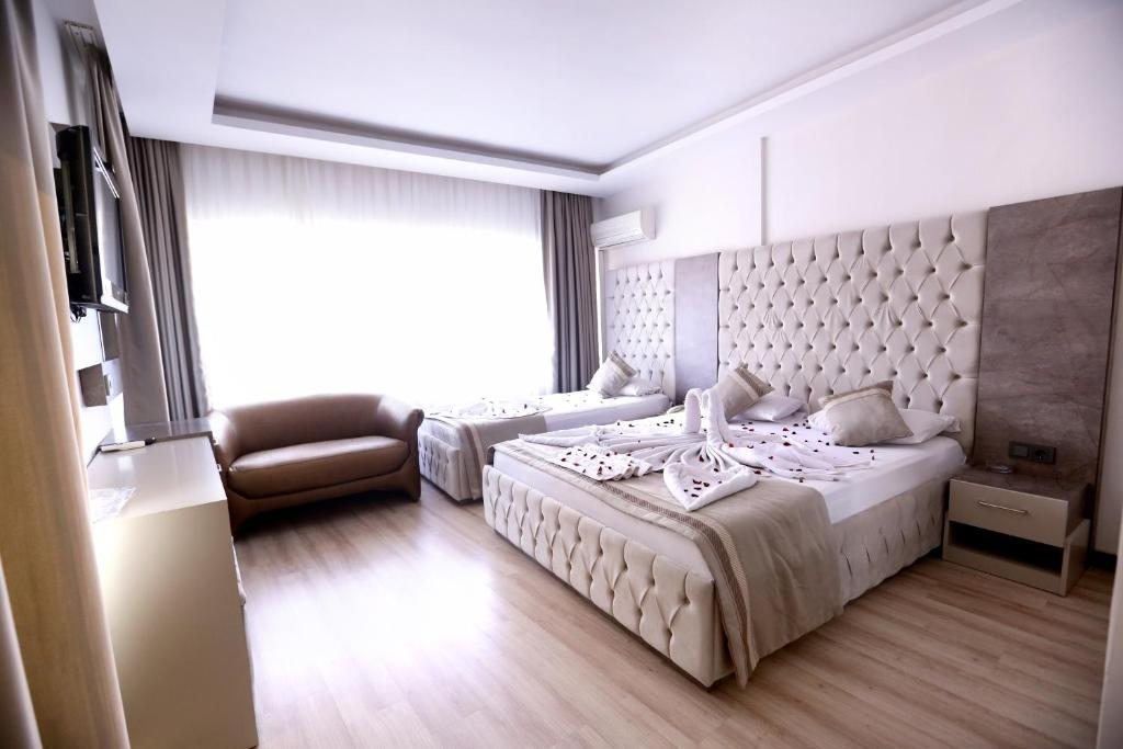 Двухместный (Стандартный двухместный номер с 1 кроватью или 2 отдельными кроватями) отеля Kivrak Hotel, Анталия