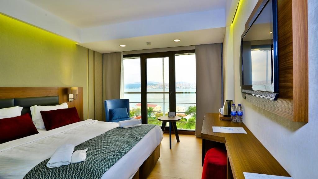 Двухместный (Двухместный номер Делюкс с 1 кроватью или 2 отдельными кроватями, вид на Босфор) отеля Anjer Bosphorus, Стамбул