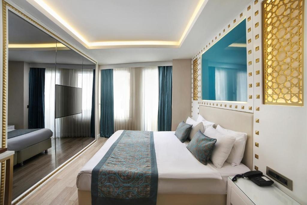 Сьюит (Роскошный семейный люкс с 3 спальнями - Бесплатное посещение спа-центра) отеля Great Fortune, Стамбул