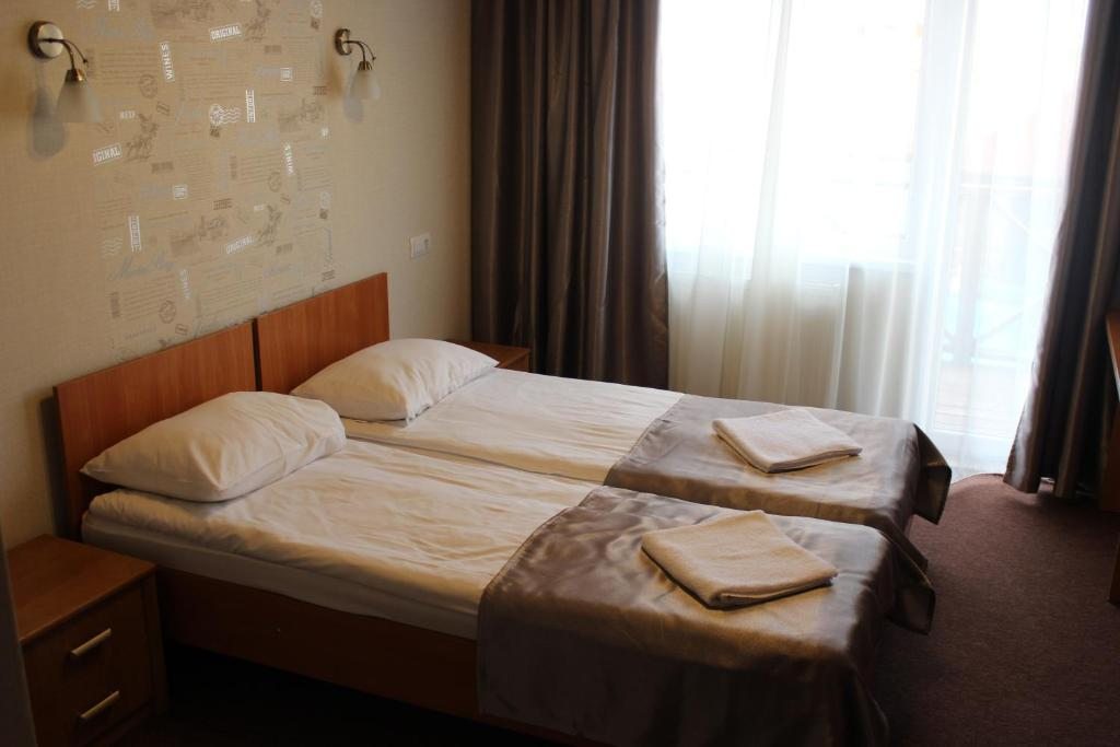 Двухместный (Стандартный двухместный номер с 2 отдельными кроватями) отеля Гранд Сокольники