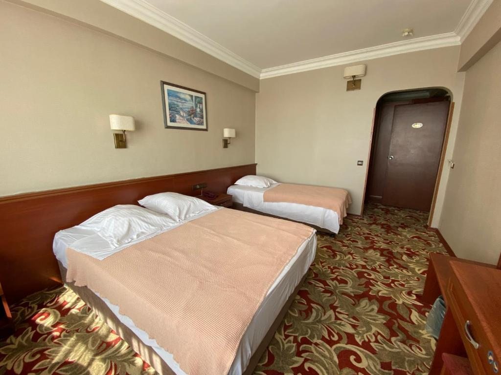 Двухместный (Двухместный номер с 1 кроватью или 2 отдельными кроватями) отеля Monopol, Стамбул