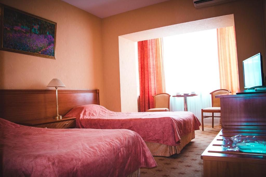 Двухместный (Двухместный номер с 2 отдельными кроватями и ванной) отеля Белый Лотос, Элиста