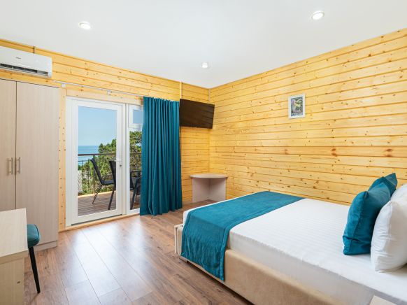 Фотография номера гостевого дома Можевеловый парк