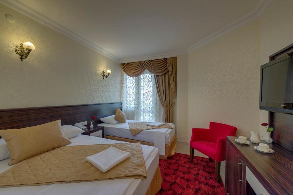 Трехместный (Стандартный трехместный номер) отеля Konya6 Elit Hotel, Анталия