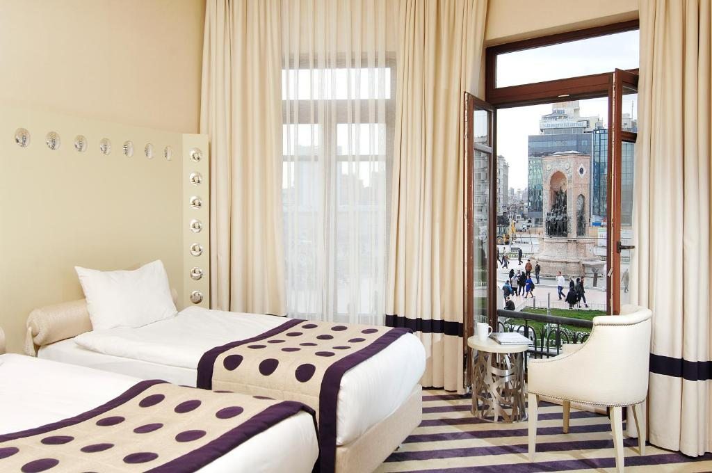 Двухместный (Улучшенный двухместный номер с 1 кроватью или 2 отдельными кроватями) отеля Taxim Hill, Стамбул