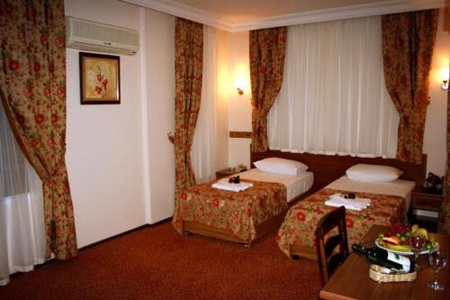 Двухместный (Стандартный двухместный номер с 2 отдельными кроватями) отеля Triana Hotel, Анталия