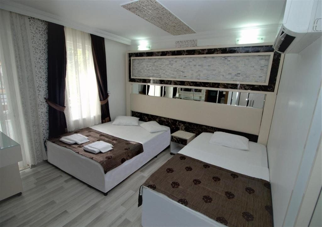 Двухместный (Стандартный двухместный номер с 1 кроватью или 2 отдельными кроватями) отеля Behram Hotel, Анталия