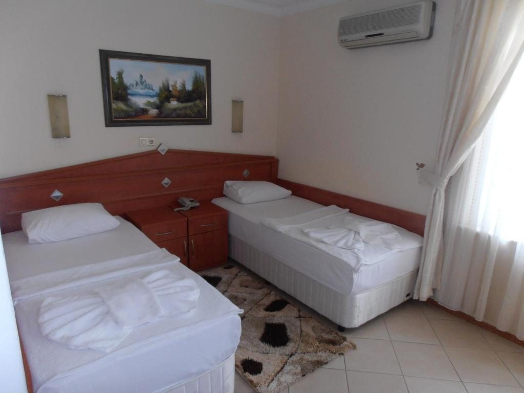 Двухместный (Стандартный двухместный номер с 1 кроватью или 2 отдельными кроватями) отеля Beyaz Melek Hotel, Анталия