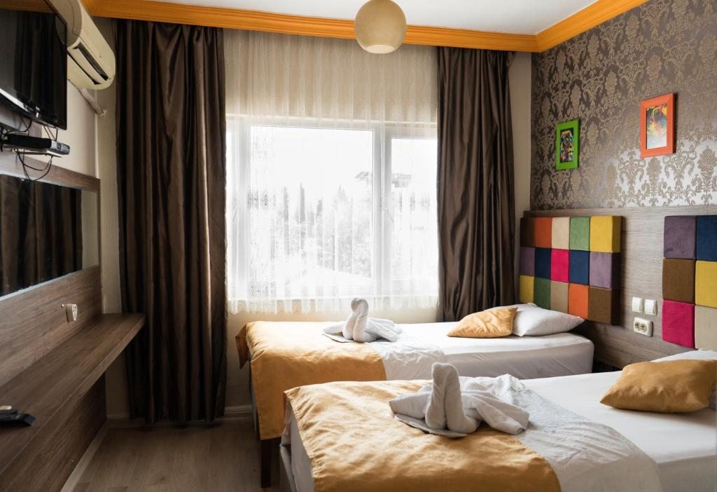 Двухместный (Стандартный двухместный номер с 2 отдельными кроватями) отеля Hotel Twenty, Анталия