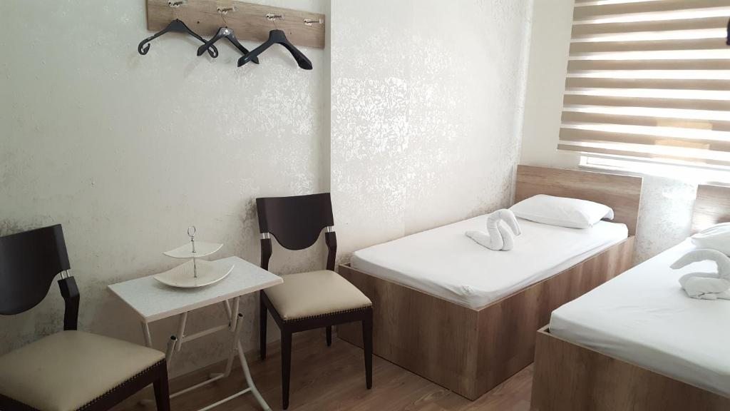 Двухместный (Двухместный номер с 1 кроватью и собственной ванной комнатой) отеля Köşk Hotel, Анталия