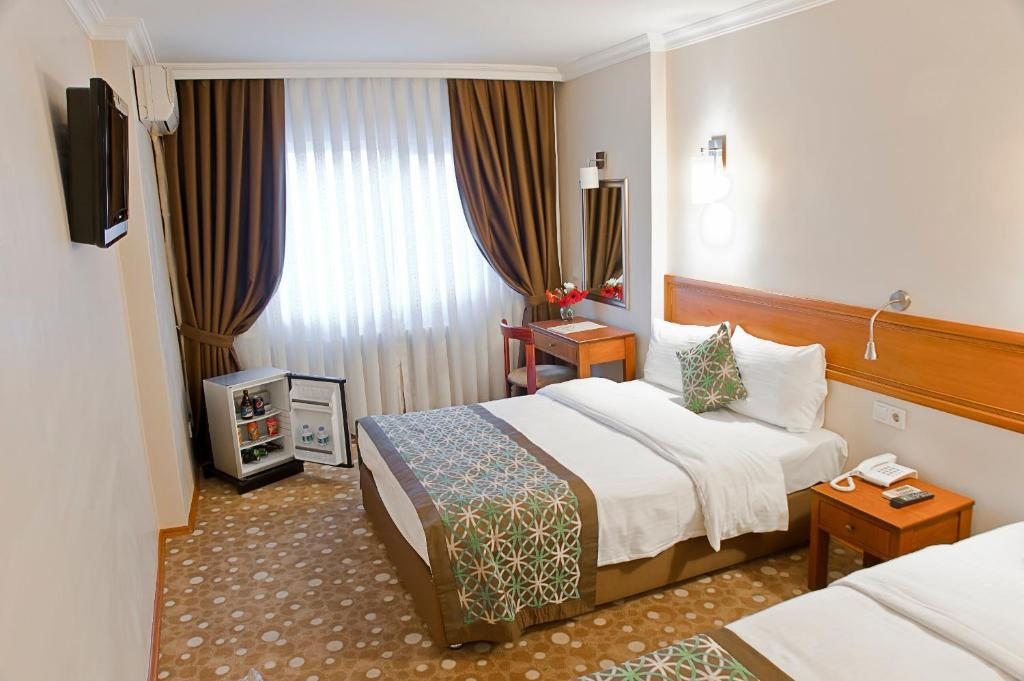 Двухместный (Стандартный двухместный номер с 1 кроватью или 2 отдельными кроватями) отеля Avlonya, Стамбул