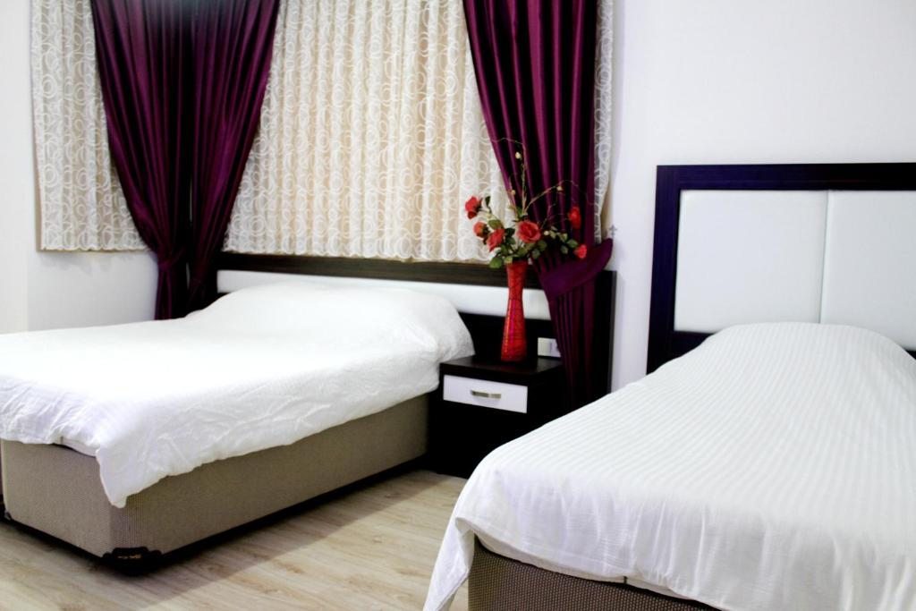 Двухместный (Стандартный двухместный номер с 2 отдельными кроватями и видом на море) отеля Volkii Hotel, Анталия