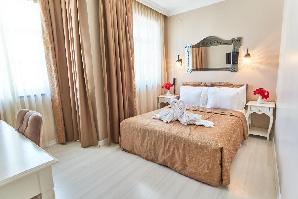 Двухместный (Двухместный номер Делюкс с 1 кроватью или 2 отдельными кроватями) отеля Celal Sultan Hotel Special Class, Стамбул