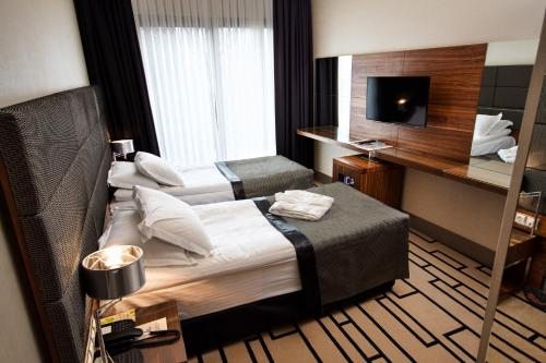 Двухместный (Специальное предложение для группового размещения - 5 улучшенных двухместных номеров с 1 кроватью или 2 отдельными кроватями) отеля Cihangir Hotel, Стамбул