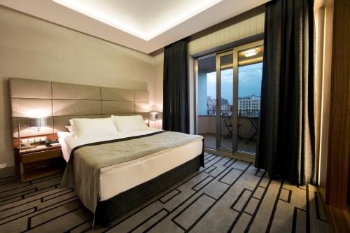 Двухместный (Специальное предложение для группового размещения - 3 улучшенных двухместных номера с 1 кроватью или 2 отдельными кроватями) отеля Cihangir Hotel, Стамбул