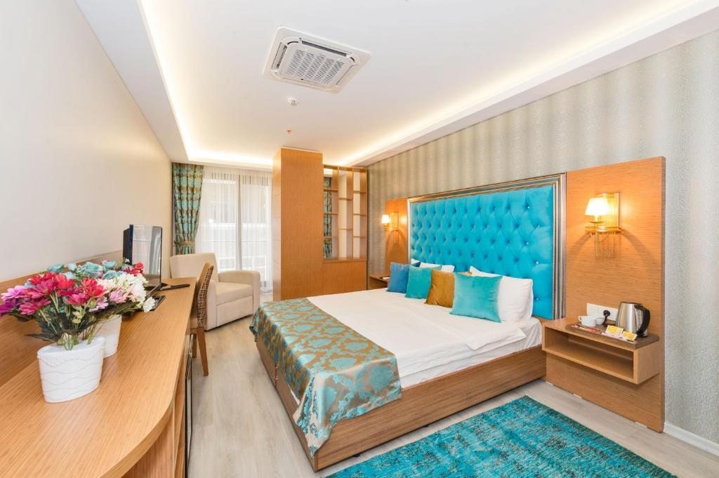 Двухместный (Двухместный номер Делюкс с 1 кроватью или 2 отдельными кроватями) отеля Grand Palace, Стамбул