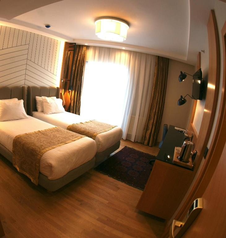 Двухместный (Двухместный номер с 1 кроватью или 2 отдельными кроватями) отеля Maywood Hotel, Стамбул