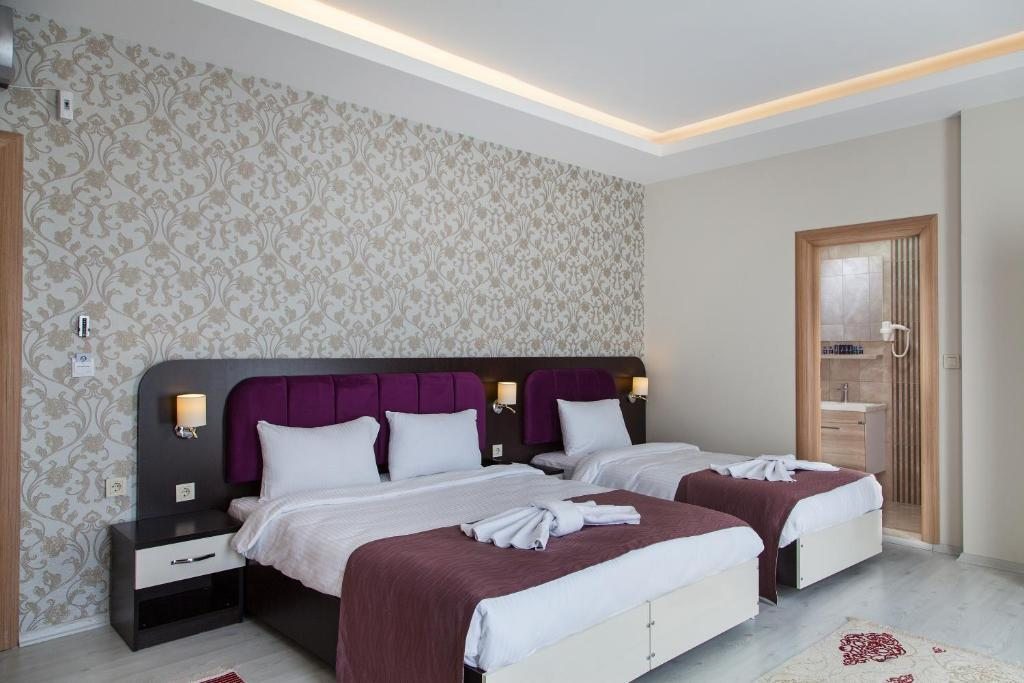Сьюит (Двухуровневый люкс) отеля Niconya Port Suite&Hotel, Стамбул