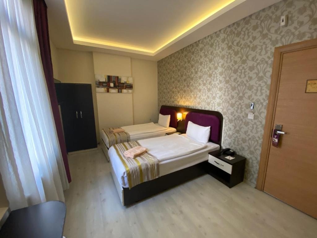 Двухместный (Двухместный номер Делюкс с 2 отдельными кроватями) отеля Niconya Port Suite&Hotel, Стамбул