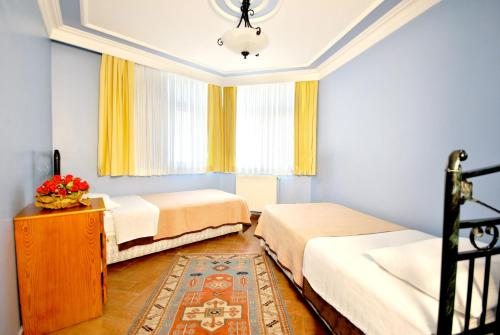 Двухместный (Двухместный номер с 1 кроватью или 2 отдельными кроватями и общей ванной комнатой) отеля Side Hotel, Стамбул