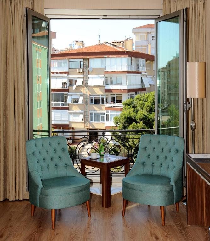 Двухместный (Улучшенный двухместный номер с 1 кроватью или 2 отдельными кроватями) отеля The Grand Mira Hotel, Стамбул