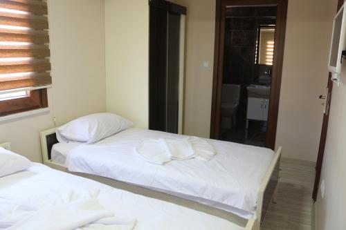 Двухместный (Двухместный номер с 1 кроватью или 2 отдельными кроватями и собственной ванной комнатой) отеля Beyoglu Huzur, Стамбул