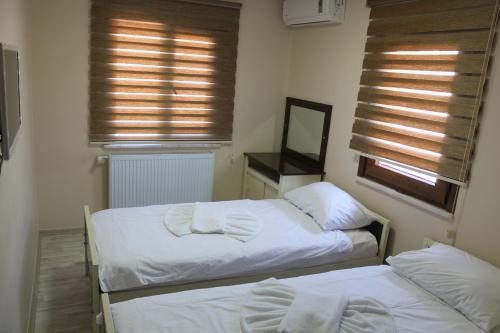 Двухместный (Номер с 1 двуспальной кроватью или 2 односпальными кроватями и ванной комнатой) отеля Beyoglu Huzur, Стамбул