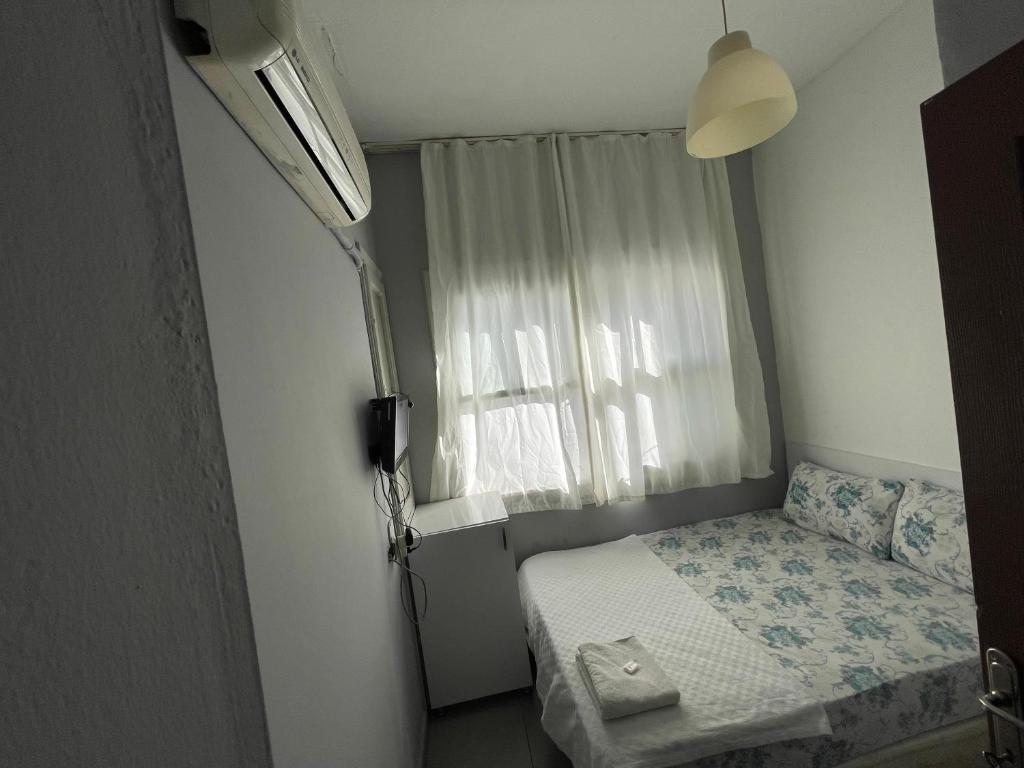 Двухместный (Двухместный номер с 1 кроватью или 2 отдельными кроватями и собственной ванной комнатой) гостевого дома Ersoy Efe Pansiyon, Анталия
