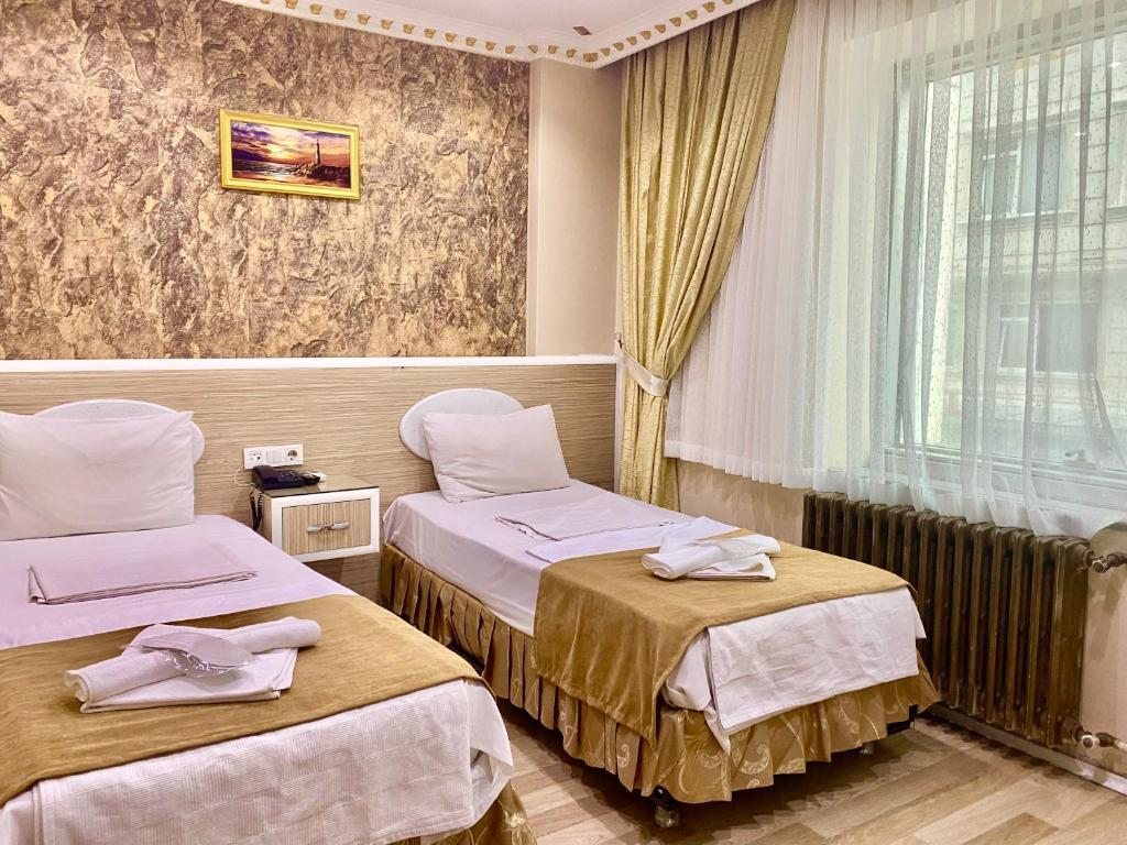 Двухместный (Двухместный номер эконом-класса с 1 кроватью или 2 отдельными кроватями) отеля Grand Oral, Стамбул
