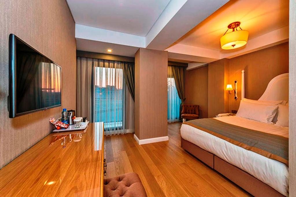 Двухместный (Улучшенный двухместный номер с 1 кроватью или 2 отдельными кроватями) отеля Hanna, Стамбул
