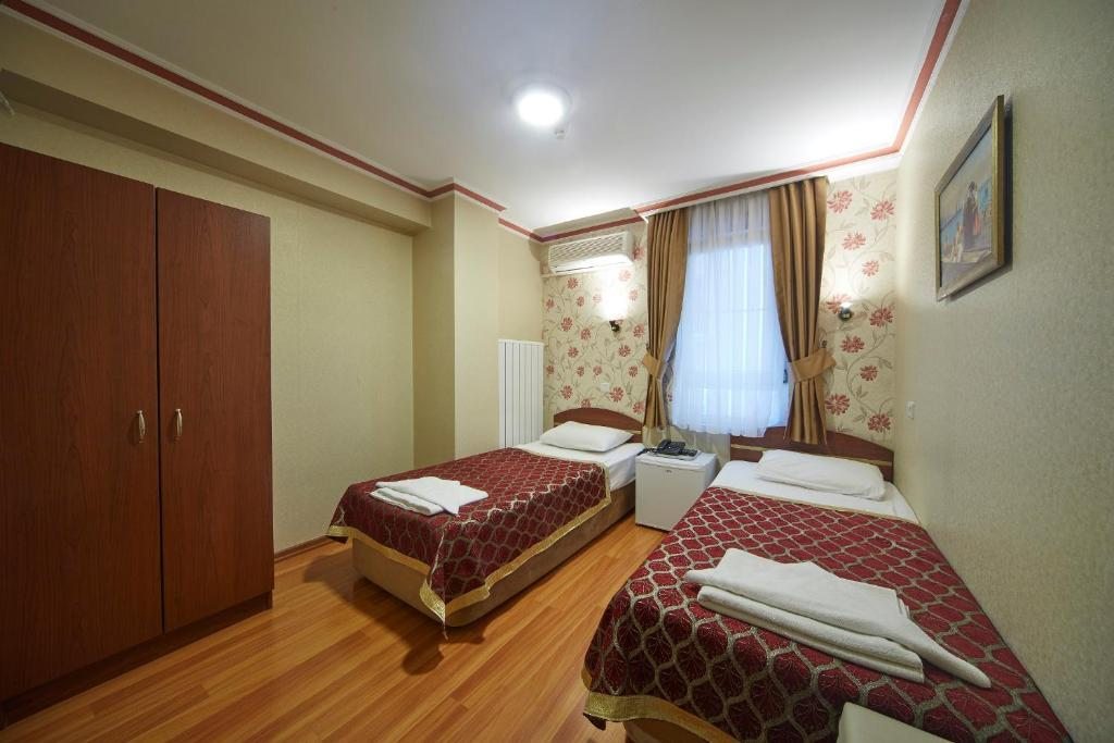 Двухместный (Стандартный двухместный номер с 1 кроватью или 2 отдельными кроватями) отеля Akcinar, Стамбул