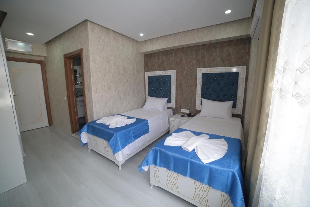 Двухместный (Большой двухместный номер с 1 кроватью или 2 отдельными кроватями) отеля Hotel Aksaray, Стамбул
