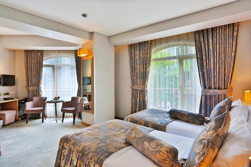 Двухместный (Улучшенный двухместный номер с 1 кроватью или 2 отдельными кроватями) отеля Momento - Special Category, Стамбул