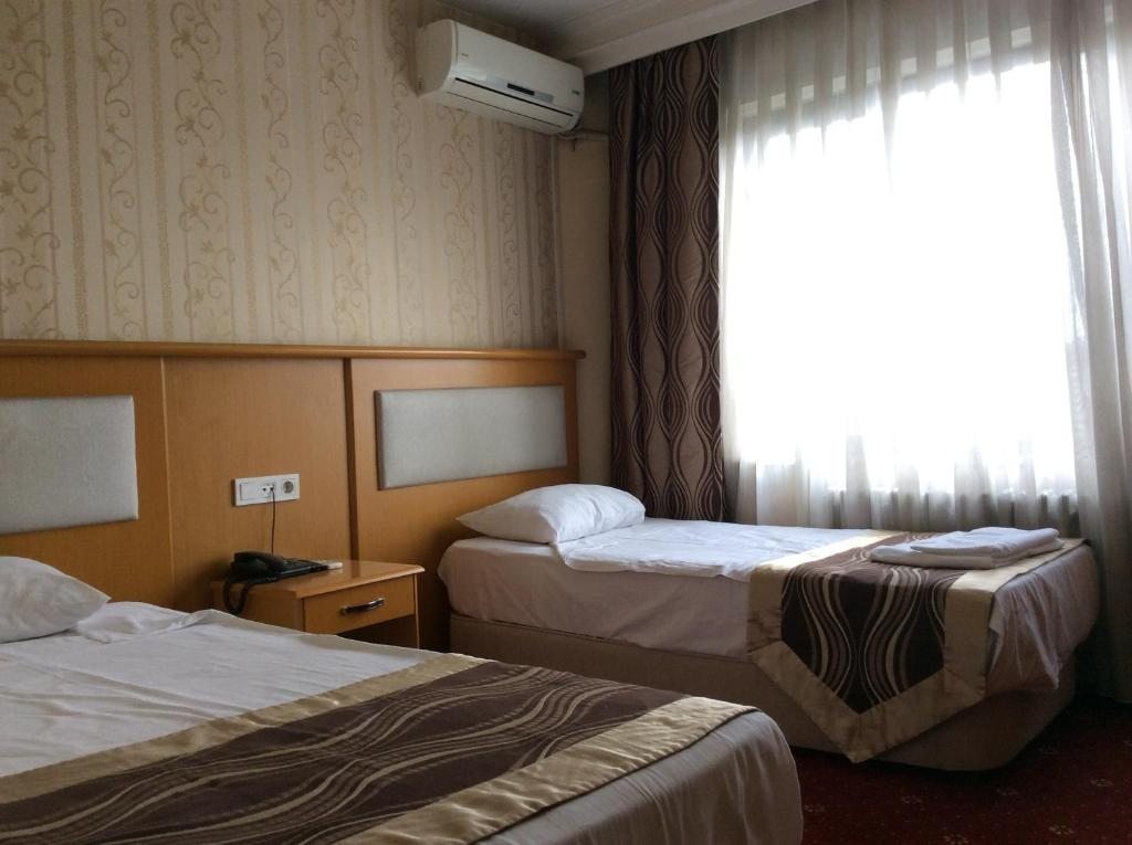 Двухместный (Двухместный номер с 1 кроватью или 2 отдельными кроватями) отеля Ilıcak, Стамбул