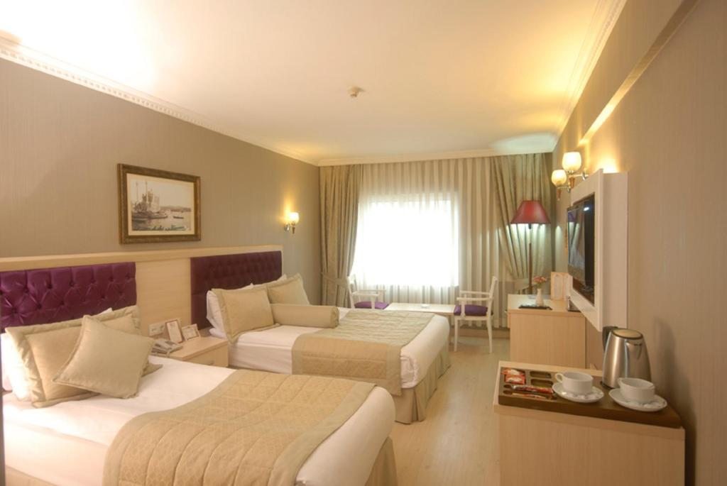 Двухместный (Стандартный двухместный номер с 1 кроватью или 2 отдельными кроватями) отеля Osmanbey Fatih, Стамбул