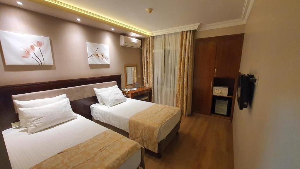 Двухместный (Стандартный двухместный номер с 2 отдельными кроватями) отеля Asur, Стамбул