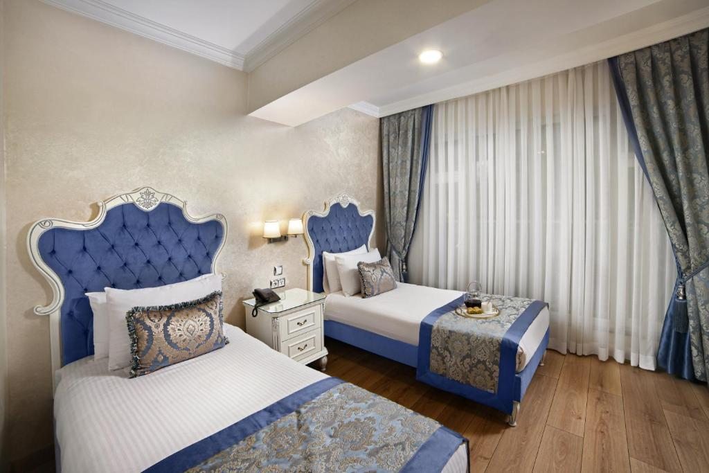 Двухместный (Двухместный номер эконом-класса с 1 кроватью или 2 отдельными кроватями) отеля Ayasultan, Стамбул