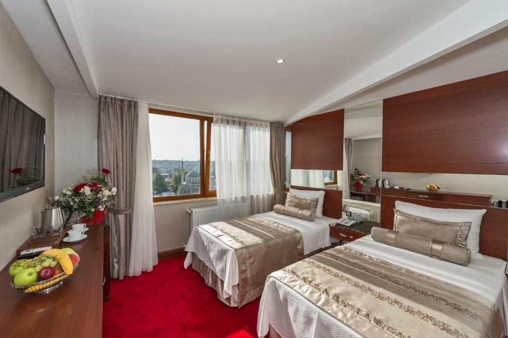 Двухместный (Стандартный двухместный номер с 2 отдельными кроватями и видом на море) отеля Eskar, Стамбул