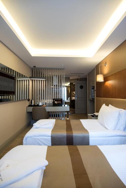 Двухместный (Улучшенный двухместный номер с 1 кроватью) апарт-отеля GK Regency Suites, Стамбул