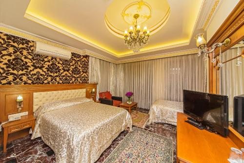 Трехместный (Улучшенный трехместный номер) отеля Lausos, Стамбул