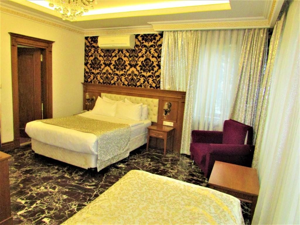 Трехместный (Стандартный трехместный номер) отеля Lausos, Стамбул