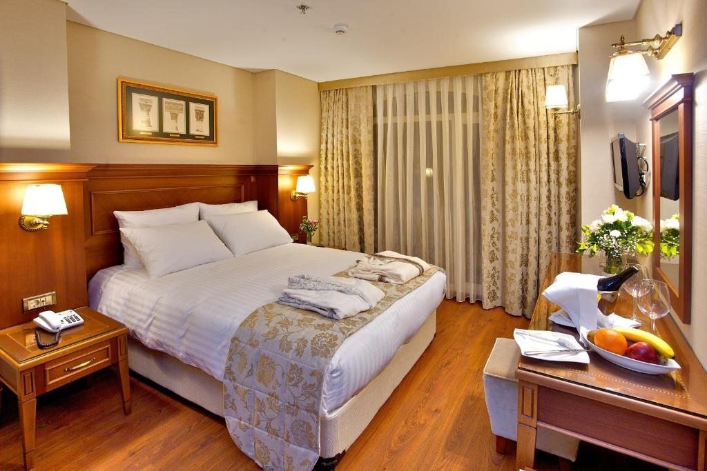 Двухместный (Стандартный двухместный номер с 1 кроватью или 2 отдельными кроватями) отеля Hotel Perula, Стамбул