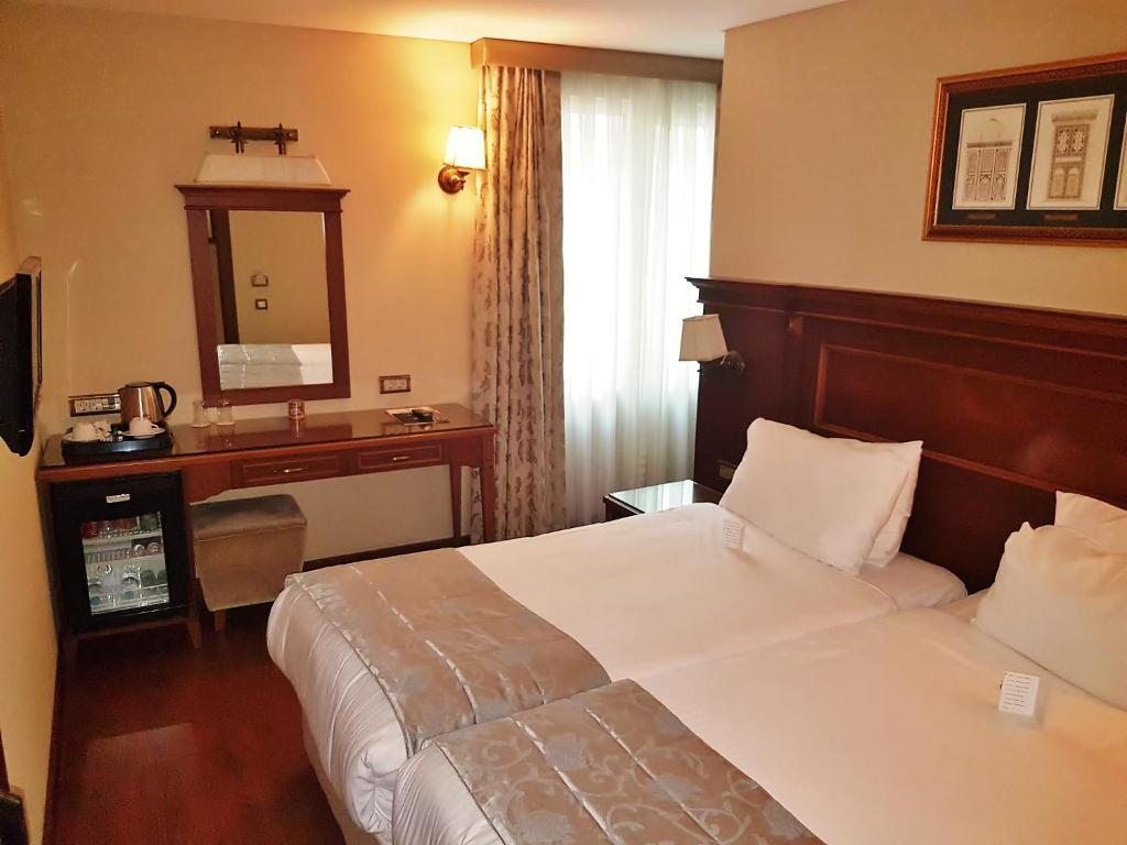 Двухместный (Двухместный номер эконом-класса с 2 отдельными кроватями) отеля Hotel Perula, Стамбул