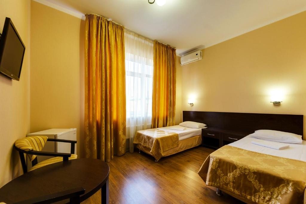 Двухместный (Бюджетный двухместный номер с 2 отдельными кроватями) отеля Западный, Краснодар