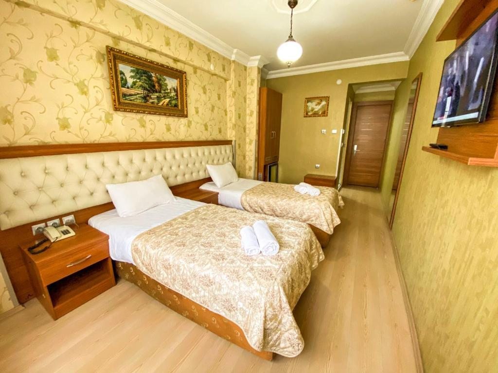 Двухместный (Стандартный двухместный номер с 2 отдельными кроватями) отеля Mekke Istanbul, Стамбул
