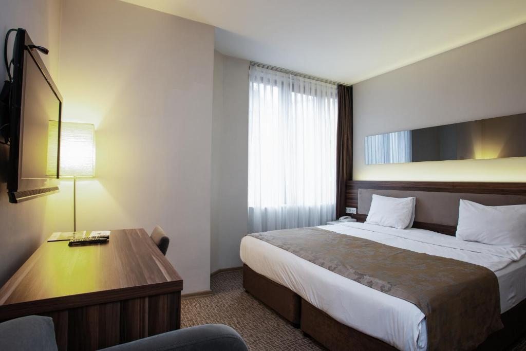 Двухместный (Стандартный двухместный номер с 1 кроватью или 2 отдельными кроватями) отеля Peninsula Galata, Стамбул