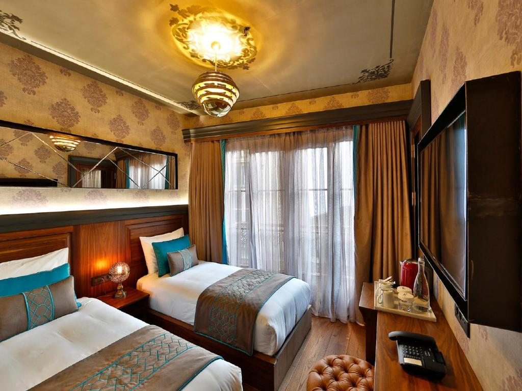 Двухместный (Двухместный номер с 2 отдельными кроватями и видом на город) отеля Sanat Pera, Стамбул